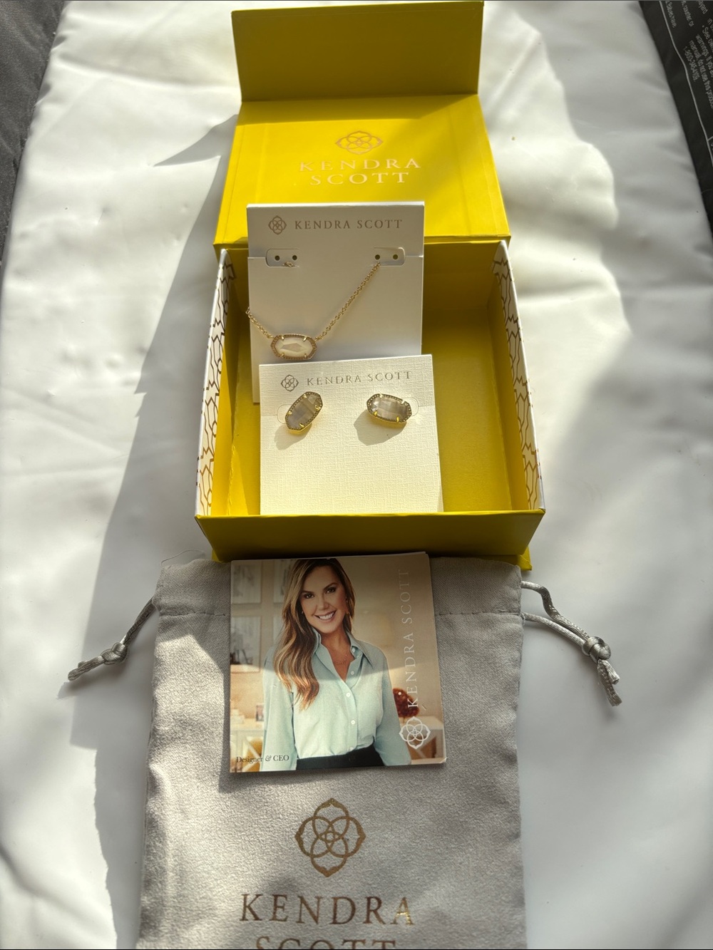 Kendra Scott Gold Necklace and Earrings with White/Opal Stones